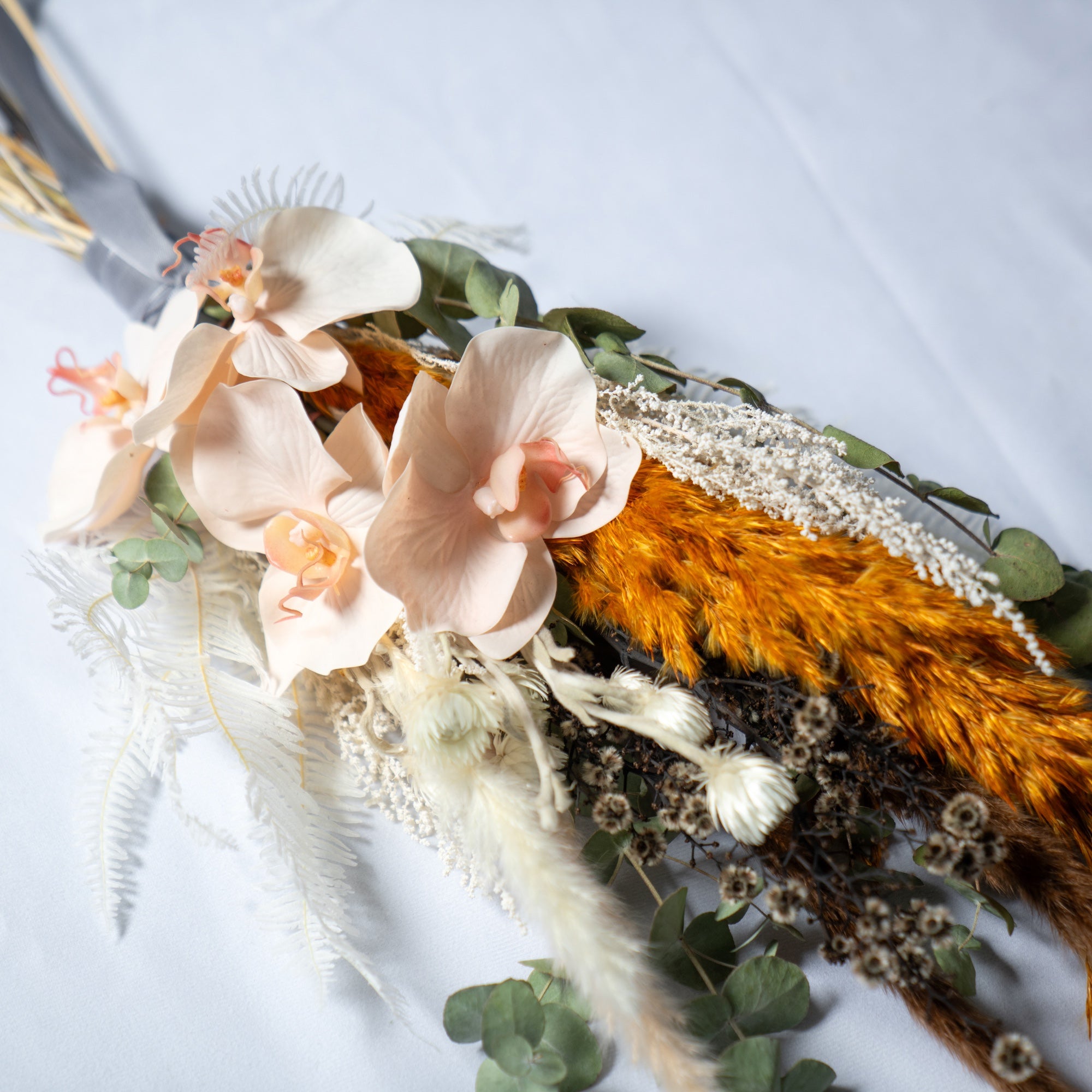 ベビーピンクの胡蝶蘭×ドライフラワーMIXブーケ